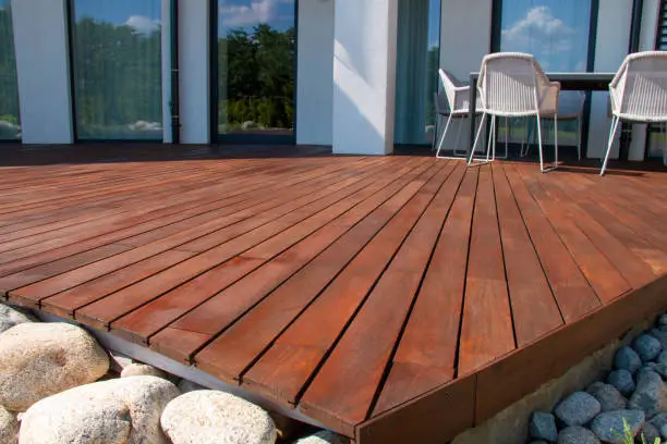 Happy customer with professionally sanded deck Northern Rivers - testimonial for GoodHands deck restoration service