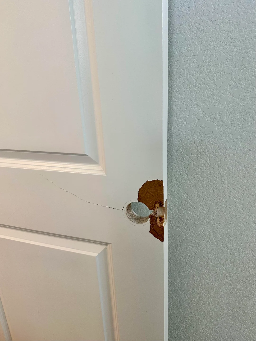 Emergency Door Repairs - Dan fixing broken door locks and security issues