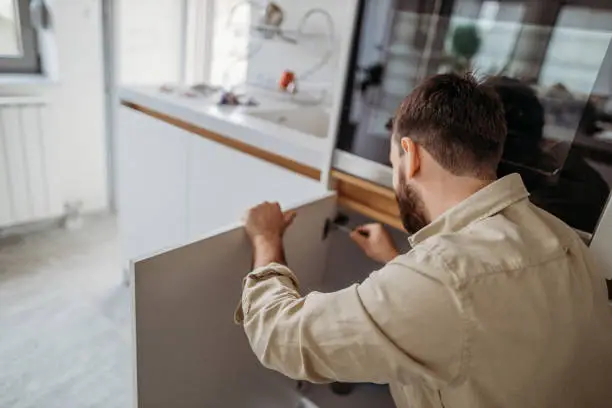 Professional kitchen cupboard door repair service Northern Rivers NSW - GoodHands fixing cabinet hinges Byron Bay
